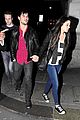 taylor lautner marie avgeropoulos matching jackets london 24